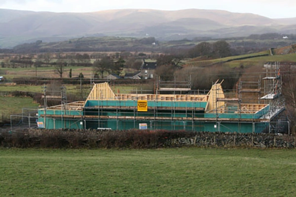 Construction of the new The Community Hall Grizebeck with exterior walls and roof rafters taking shape, 9th January 2011