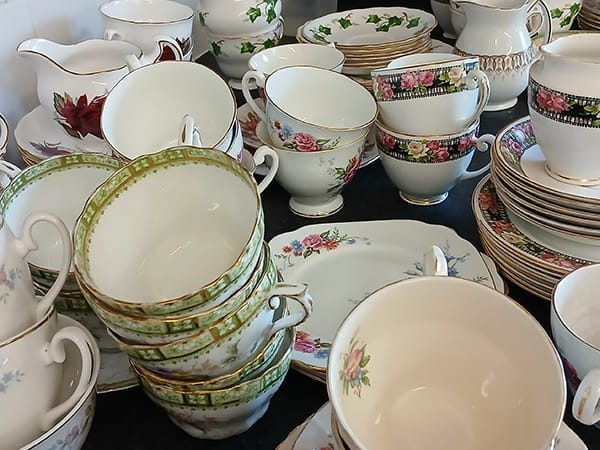 A photograph of the vintage cups, saucers, teapots and sugar bowls available for hire